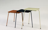 Trois tables gigognes modèle « soumba » en métal gaufré laqué rouge, noir et jaune. Embouts pieds laiton. 1956, Edition société Matégot - Galerie Kréo. H : 47, l : 33, P : 37 (cm)